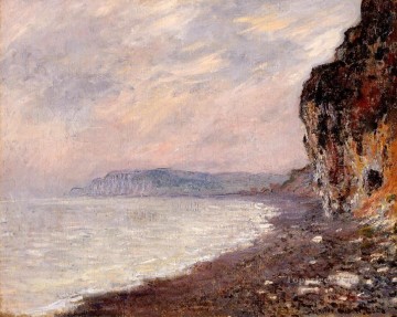 風景 Painting - 霧の中のプールヴィルの断崖 クロード・モネ・ビーチ